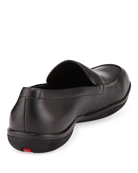 men's calf skin prada loafers.